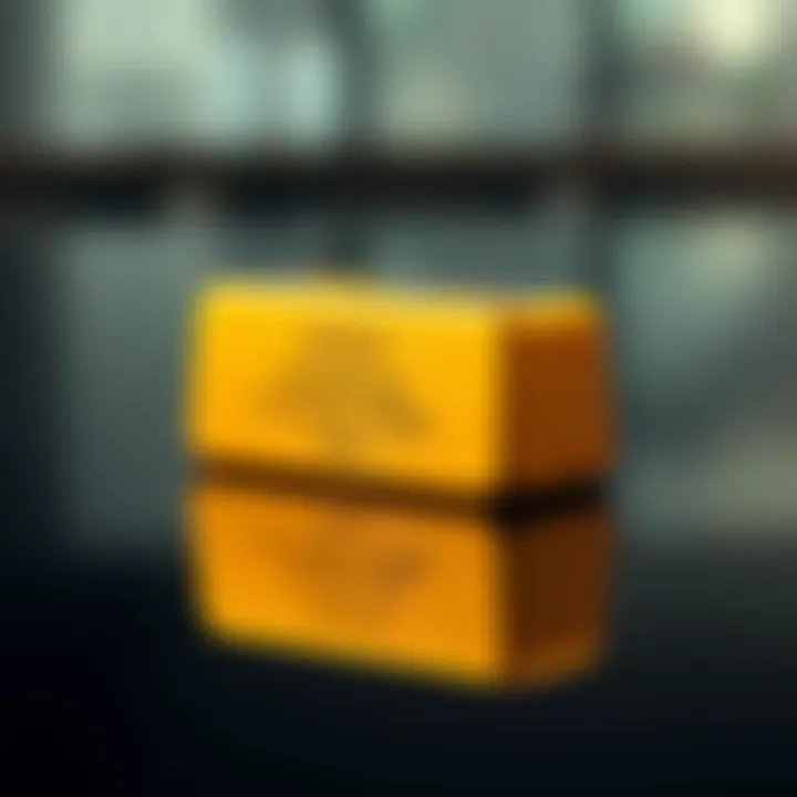Standard gold bar resting on a reflective surface showcasing its rectangular shape and stamped markings